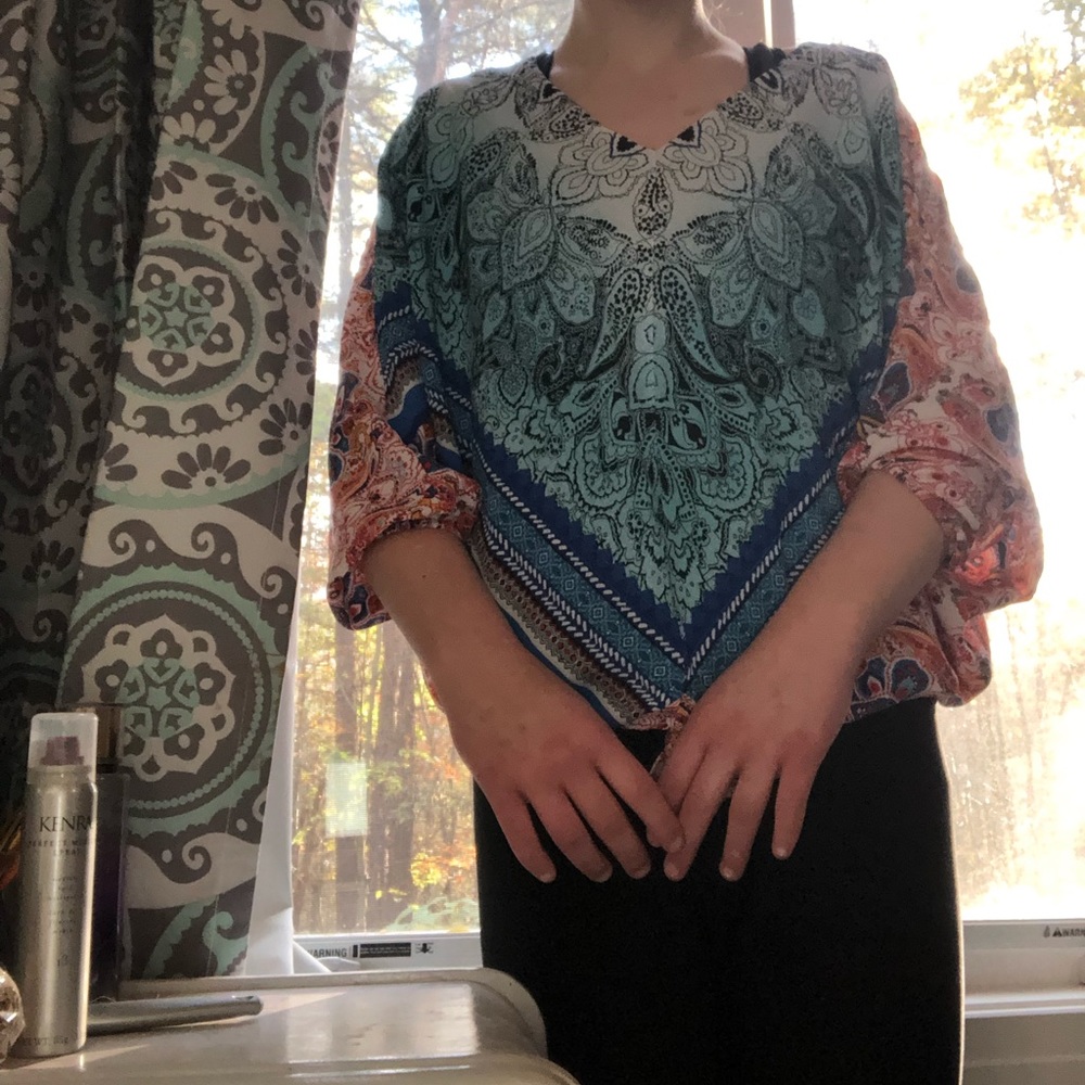 A short sleeve flowey shirt with a floral pattern